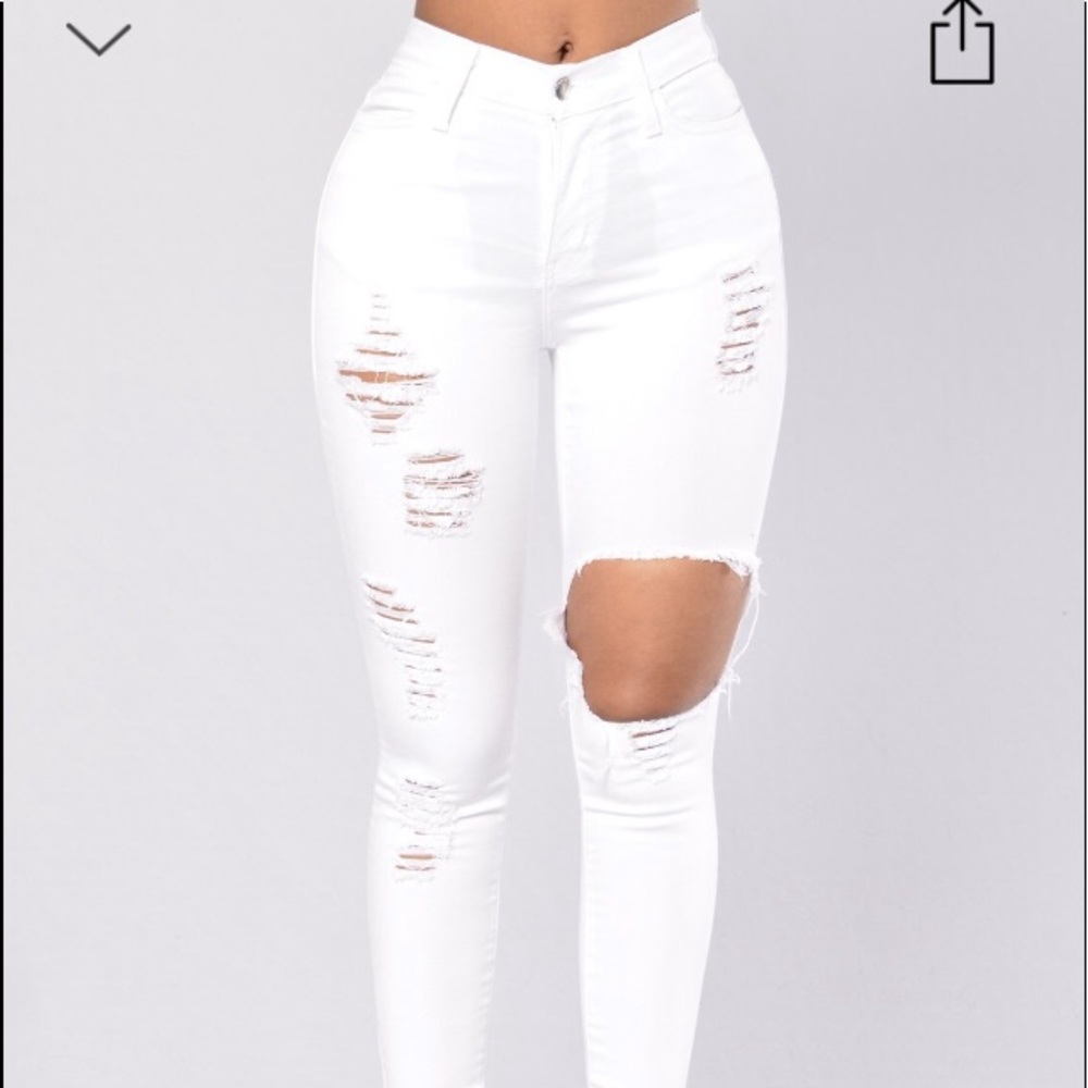 Glistening white distressed jeans